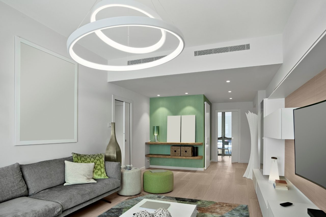 modern living room interior with sofa, a modern carpet and wooden floor
